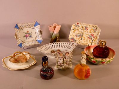 many different types of dishes and vases on the table