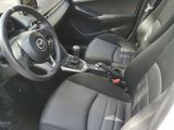 the interior of a car with a steering wheel and a dash board