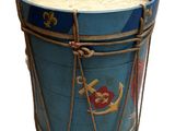 a blue drum with a pirate theme on it