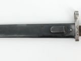 a knife that is laying on top of a table