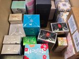 a box full of different types of soaps and soap bars