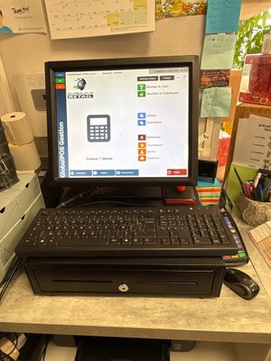 a desktop computer sitting on a desk with a keyboard and mouse