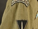 a close up of a military uniform with a patch on it