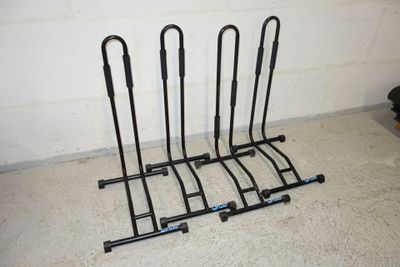 a rack that has four pairs of skis on it