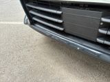a close up of the front bumper of a car