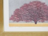 painting of a pink tree in a wooden frame on a wall