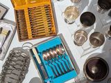 a table with a lot of silverware on it
