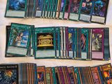 a close up of a bunch of cards on a bed