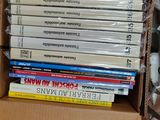 a box full of books sitting on a table