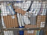 a cart full of toilet paper and toilet paper wrapped in plastic