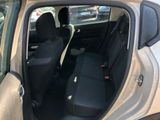 the back seats of a car are empty in the parking lot