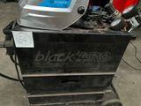 an image of a welding helmet sitting on top of a cart