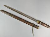pair of antique chinese swords on a white background