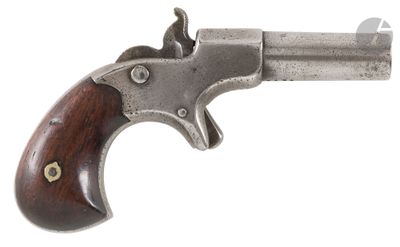 a close up of a gun with a wooden handle on a white background