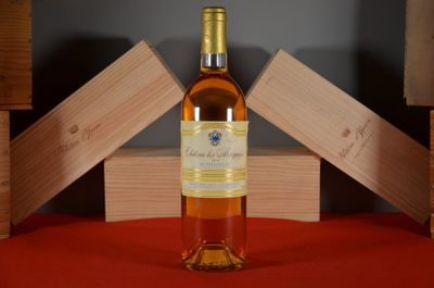 a bottle of wine that is sitting on a table