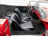 an image of a red car with its doors open