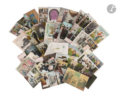 a pile of old postcards on a white surface