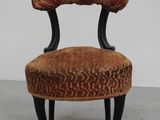 an image of a chair with a leopard print upholstered seat