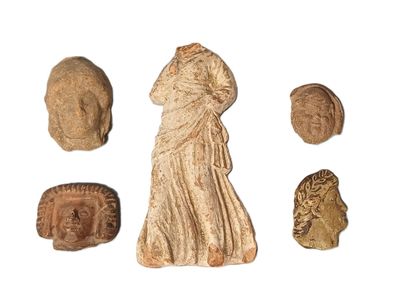 an image of a group of ancient artifacts on a white surface