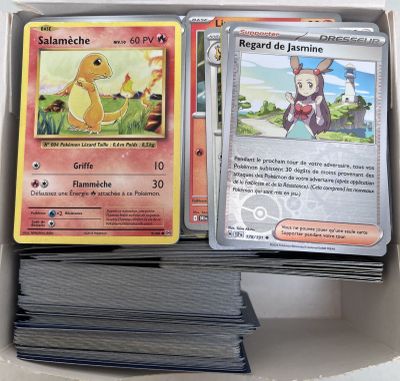 a lot of cards in a box on the table