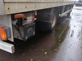 a truck that is parked on the side of the road