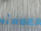 a blurry photo of a sign that says diamond