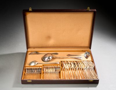 a wooden box with silverware in it on a table