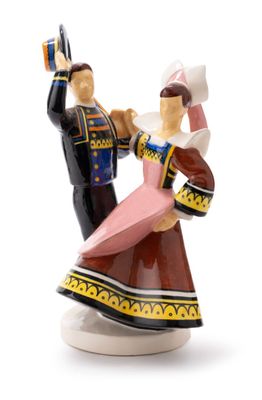 a figurine of a man and a woman dancing