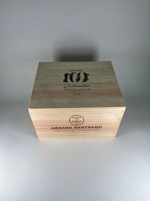 a close up of a wooden box with a label on it