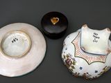 a small bowl and a small bowl sitting on a table