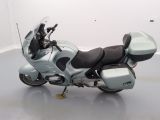 a motorcycle that is parked on the floor in a room