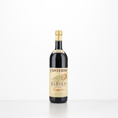 the bottle of wine is sitting on the table with a white background