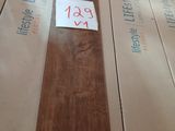 several boxes of wood are stacked on top of each other on a table