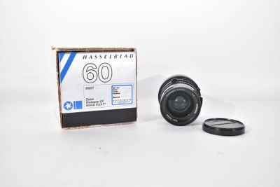 a box with a camera lens and a lens cap on it