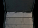 a open suitcase with a lot of papers inside of it