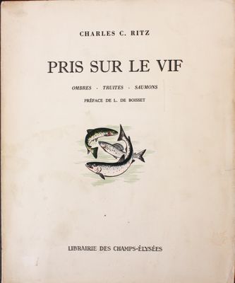 an old book with a picture of a fish on it ' s cover