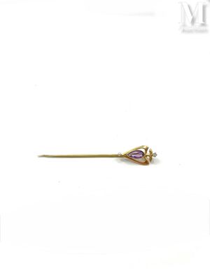 an image of a gold and amethorate broochle pin