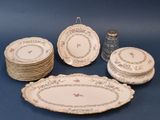 many plates that are sitting on a table