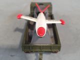 a toy airplane that is sitting on top of a box