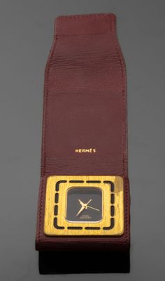 HERMES Paris Pendulette de voyage en métal doré dissimulée d… - Photo 1