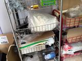 a cart that has a lot of items on it