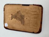 a piece of brown paper with a map on it