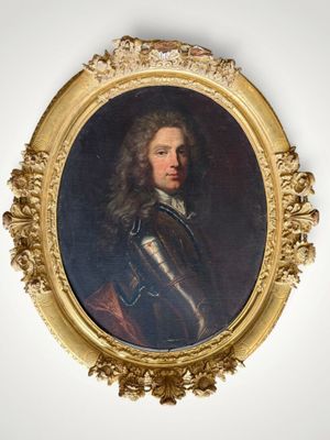 portrait of a man in armor in a gold oval frame