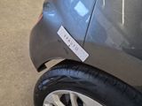 a sticker on the side of a car that says city