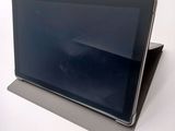 a tablet that is sitting on top of a table