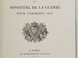 an old book with a black and white image of a coat of arms