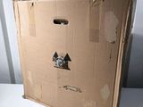 a cardboard box with a picture of a mountain on it