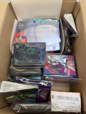 a cardboard box filled with many different types of cards