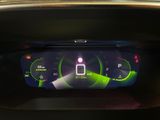 the dashboard of a car with a digital display on it