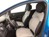 the interior of a blue car with two seats and a steering wheel